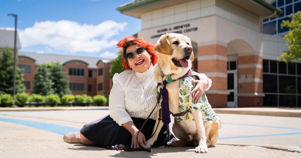 Professor Melba Vèlez-Ortiz featured in national magazine with her guide dog Professor Chad